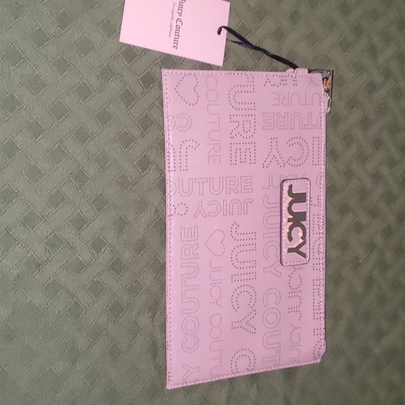 Juicy Couture Handbags - NEW OVERSIZED  JUICY WRISTLET..NEW 💋💋💋